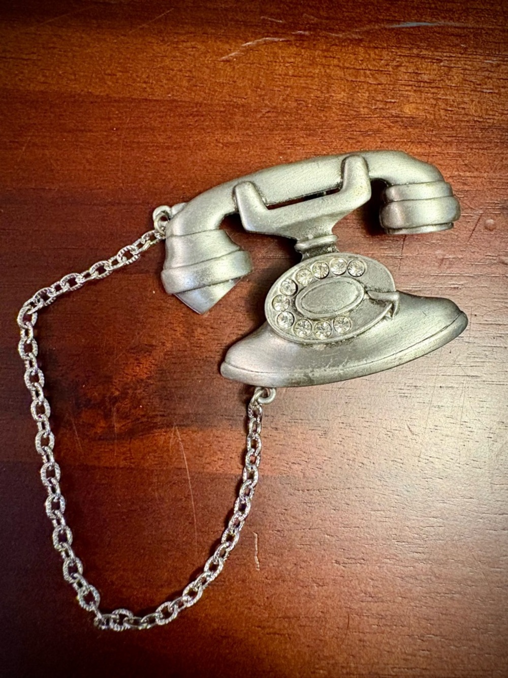 JJ Jonette Rhinestone Telephone Brooch in Silver Tone